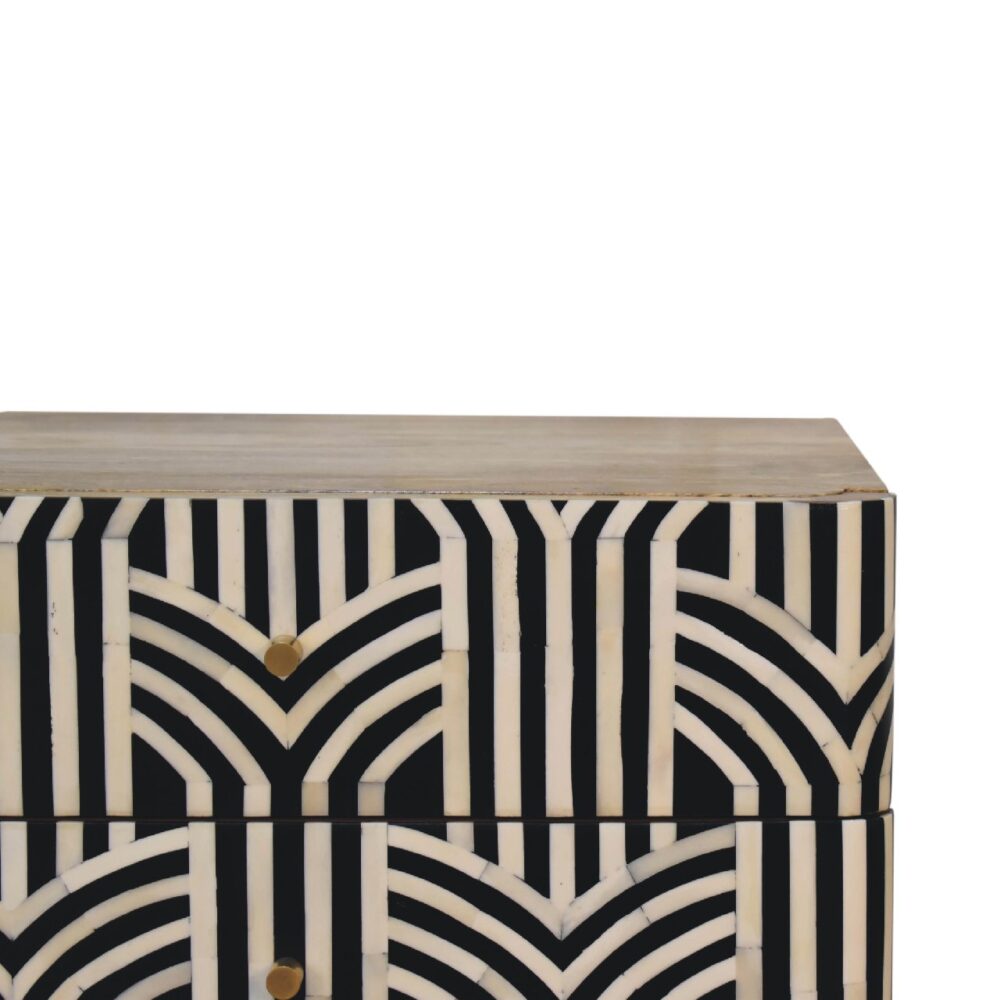 Striped geometric wooden cabinet with drawers.