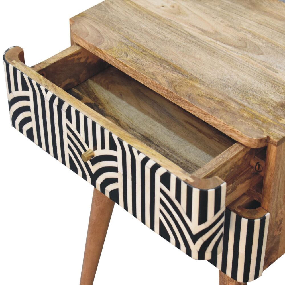 Wooden table with pattern drawer open