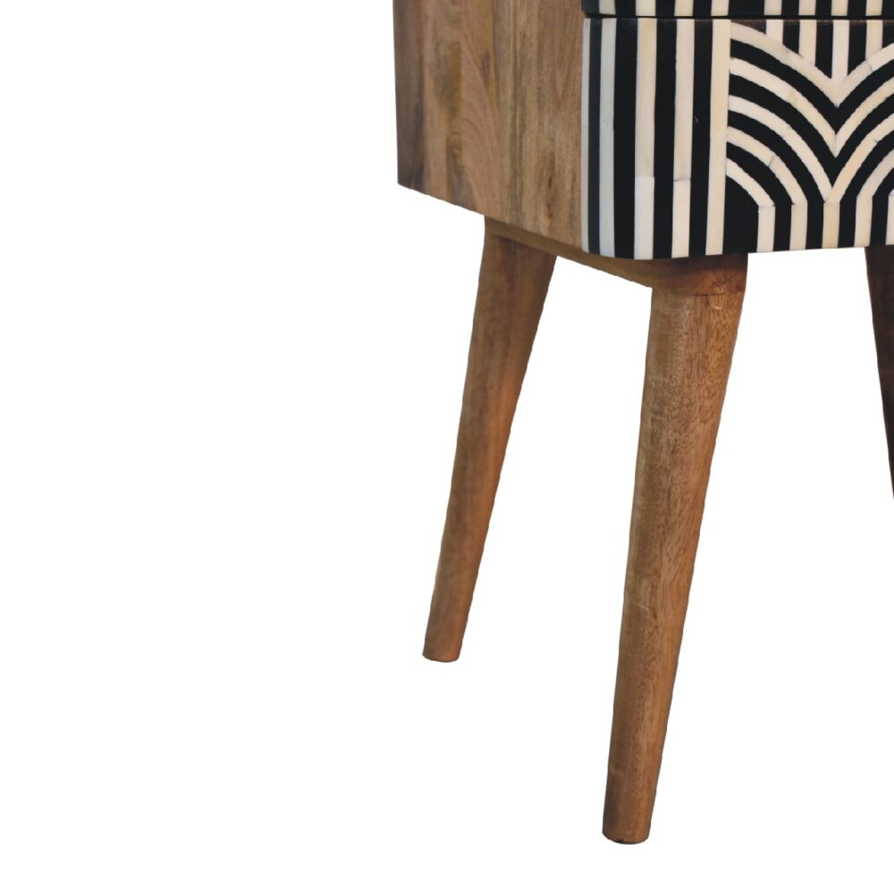 Decorative wooden table with geometric pattern design.